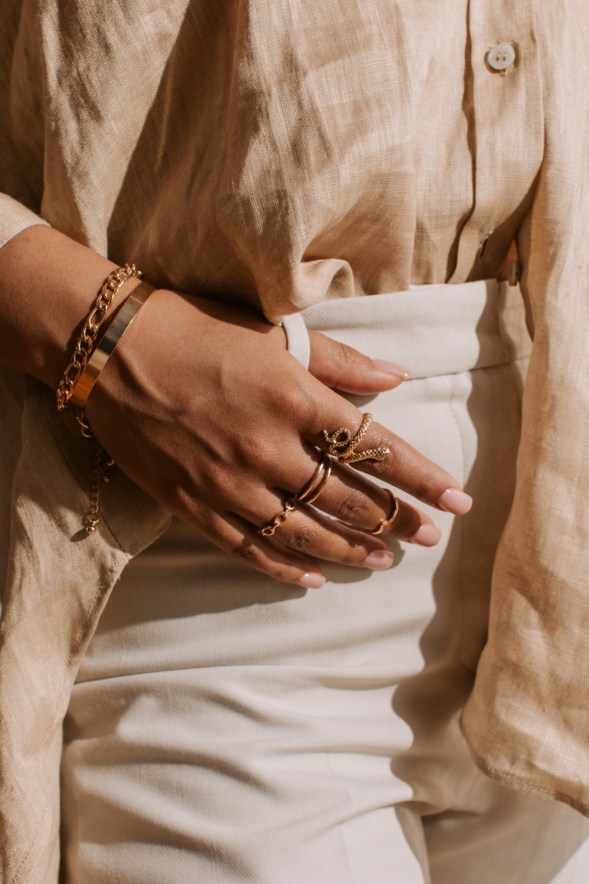 Woman Wearing Gold Jewelry