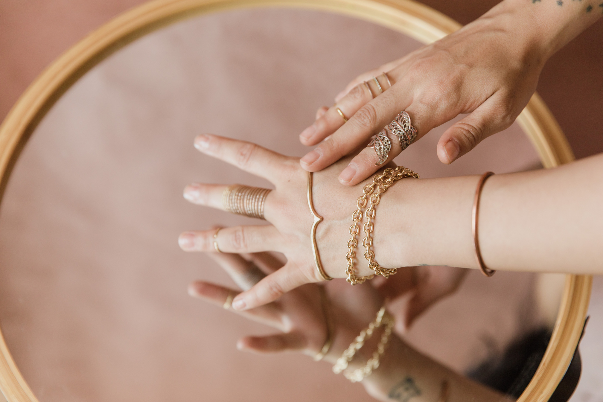 Woman Wearing Gold Ring and Gold Ring