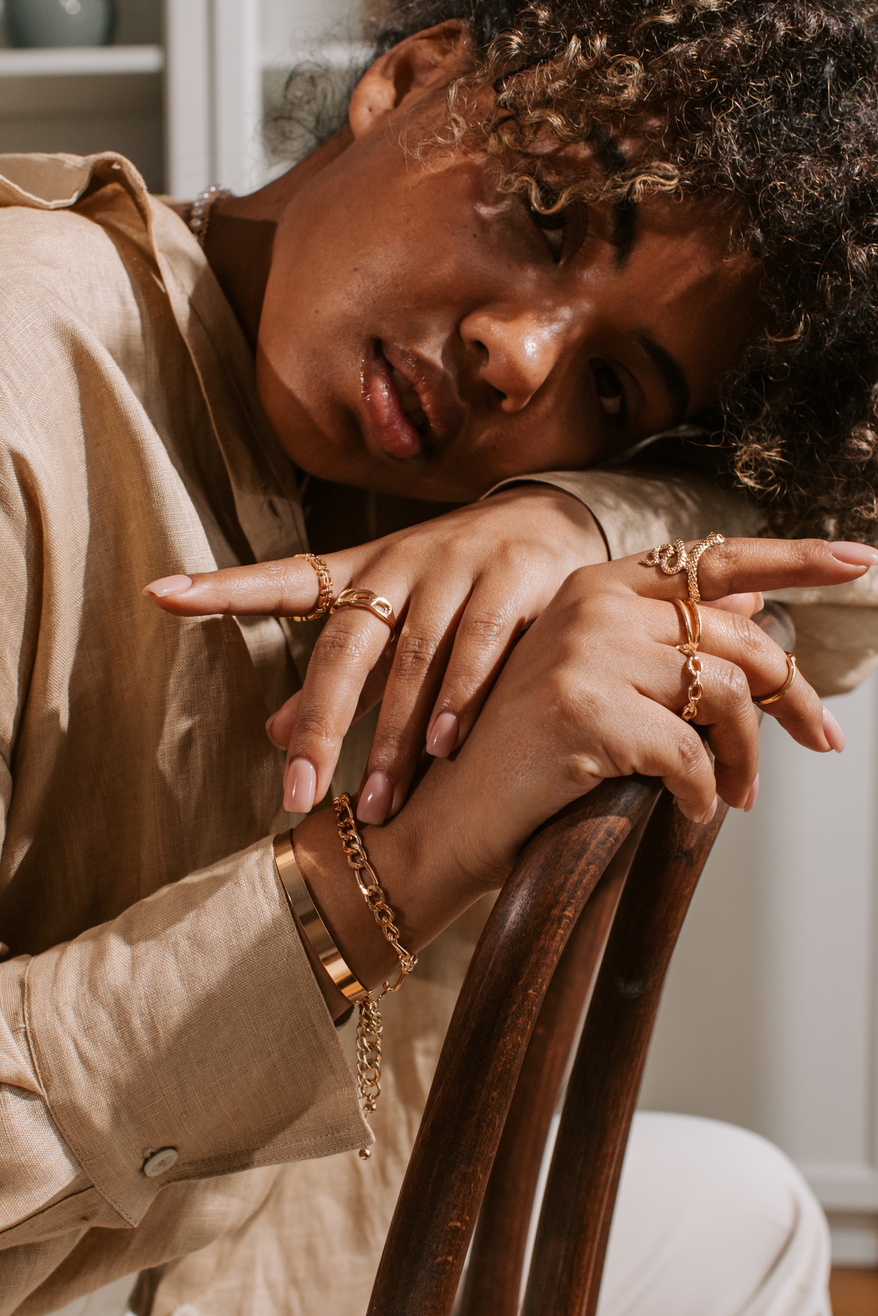 Woman Wearing Gold Jewelry